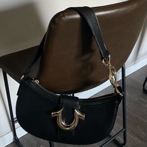 Black Shoulder Bag with Gold Accents- True Religion
